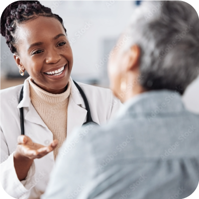 Smiling woman or doctor consulting a patient in hospital for healthcare feedback or support.